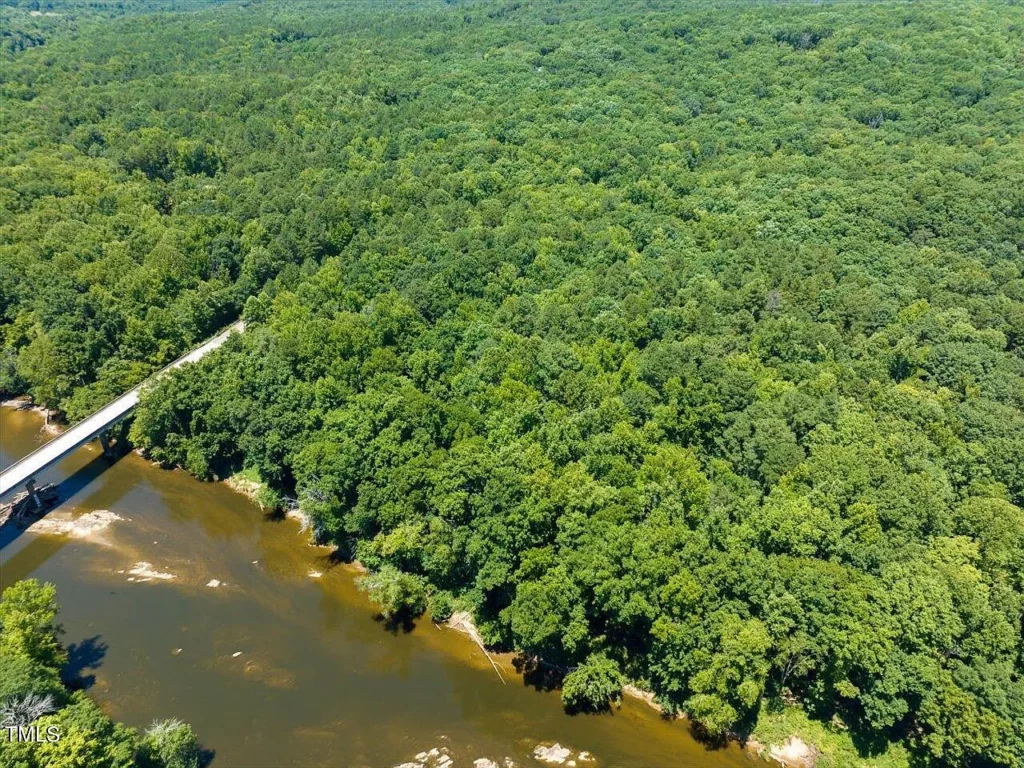 Aerial view of Haw River property in Pittsboro showing Chicken Bridge Road Bridge and River.